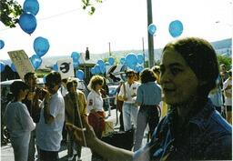 Peace walk participants with balloons