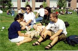 Students on campus: Outside of Arts and Education building