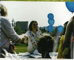 Peace walk participant handing out information