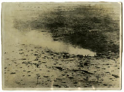   Men leaving smoke coming from trench   : Front
