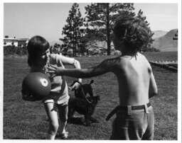 Kids outside with dogs
