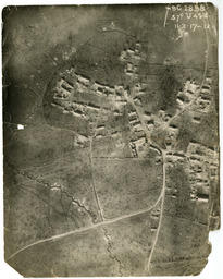   Heavily shelled unnamed village near trenchs   : Front