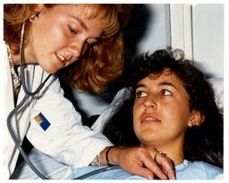 Nursing student: Checking heartbeat