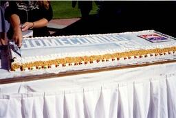 Cutting of the Homecoming 1995 cake