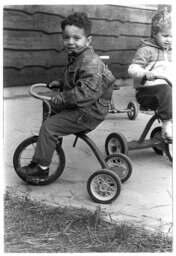 Children on tricycles