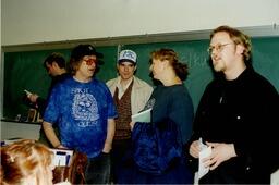 Bill Bissett with students